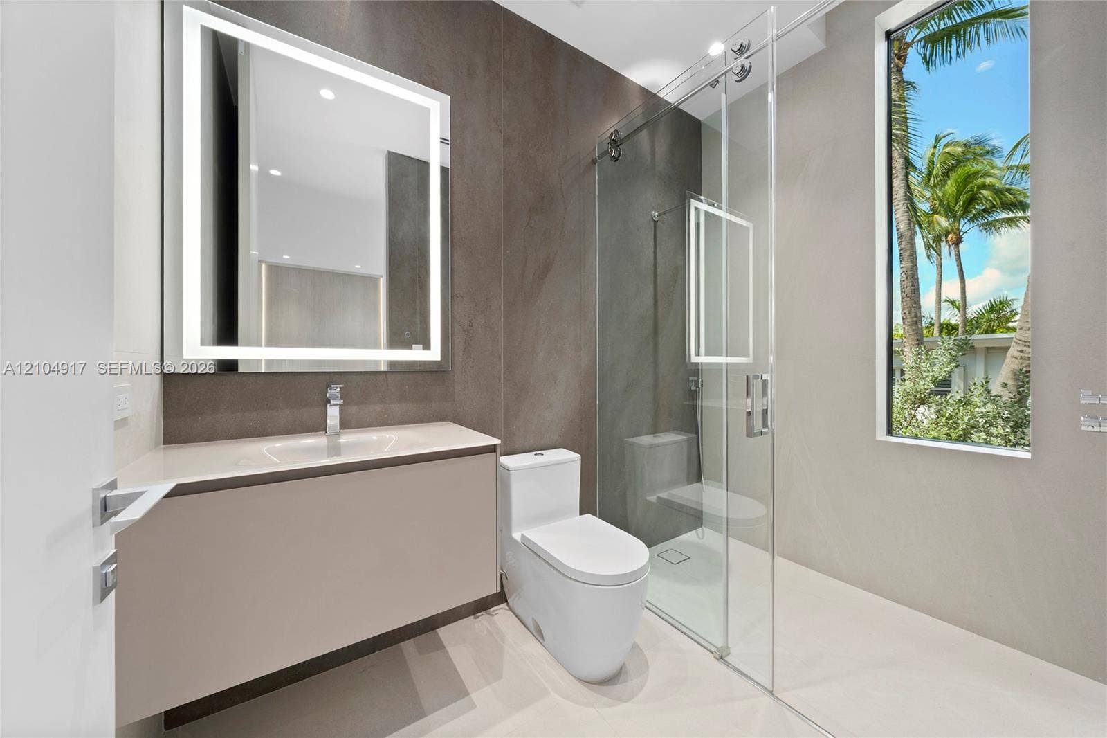 Modern vanity with a recessed sink and sleek faucet