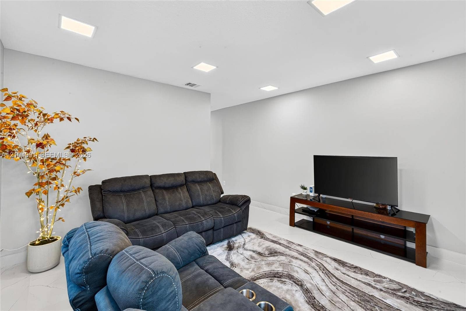 15217 SW 36th Terrace, #0, Miami, Miami, FL 33185 Neutral-toned interior space featuring light-colored tile flooring and recessed LED lighting