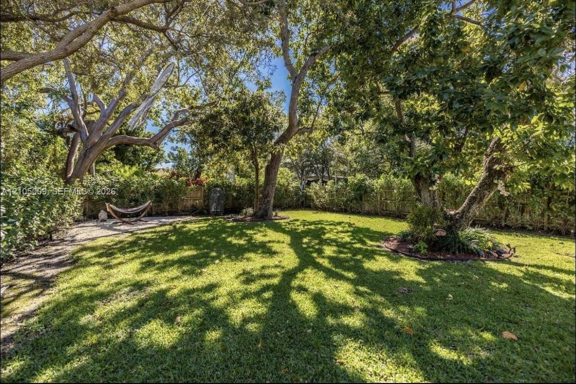254 NW 51st Street, Miami, Miami, FL 33127 Expansive lawn featuring mature trees and established landscaping