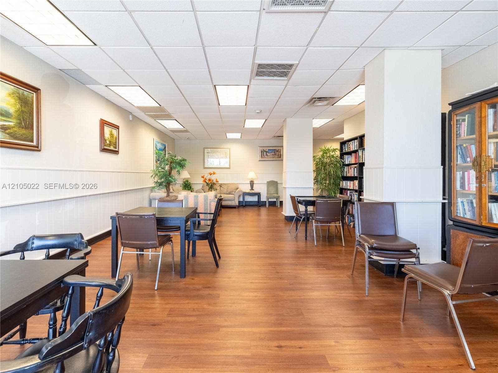 500 Bayview Drive, #1520, Sunny Isles Beach, Sunny Isles Beach, FL 33160 Wood-finish flooring throughout, white wainscoting, recessed lighting, and built-in shelving
