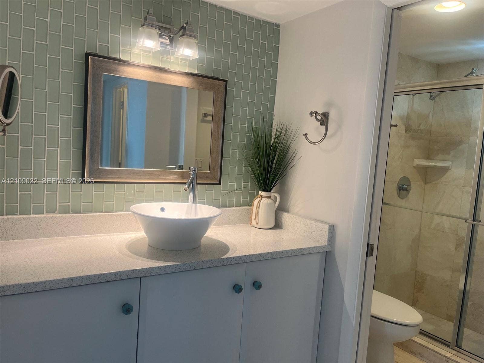 500 Bayview Drive, #1520, Sunny Isles Beach, Sunny Isles Beach, FL 33160 Vanity with a vessel sink, a light-colored countertop, and light-colored cabinetry