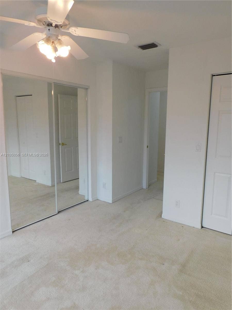16729 Amber Lake, Weston, FL 33331 White ceiling fan with integrated lighting