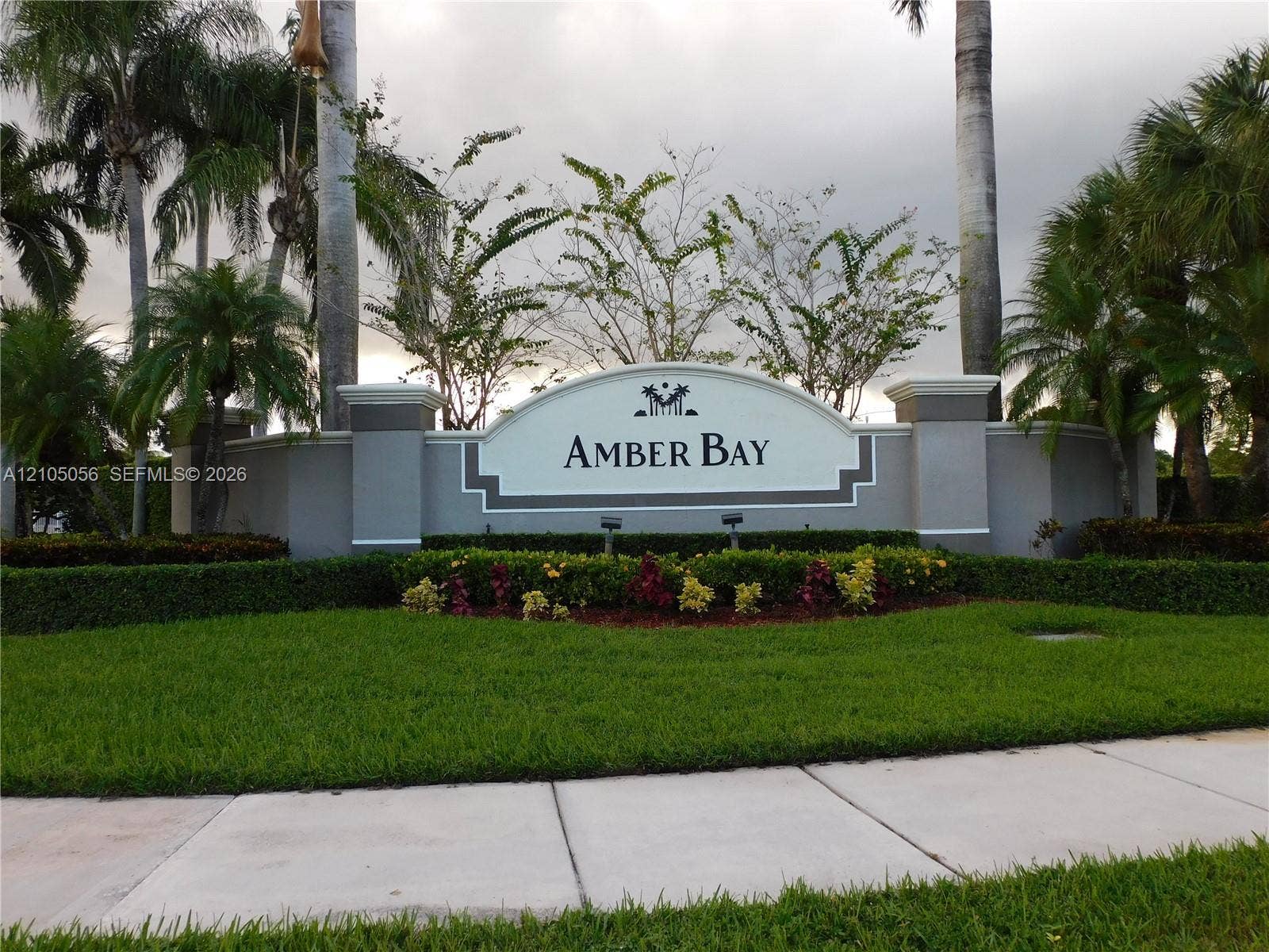 16729 Amber Lake, Weston, FL 33331 Community entrance sign featuring a curved top and integrated lighting