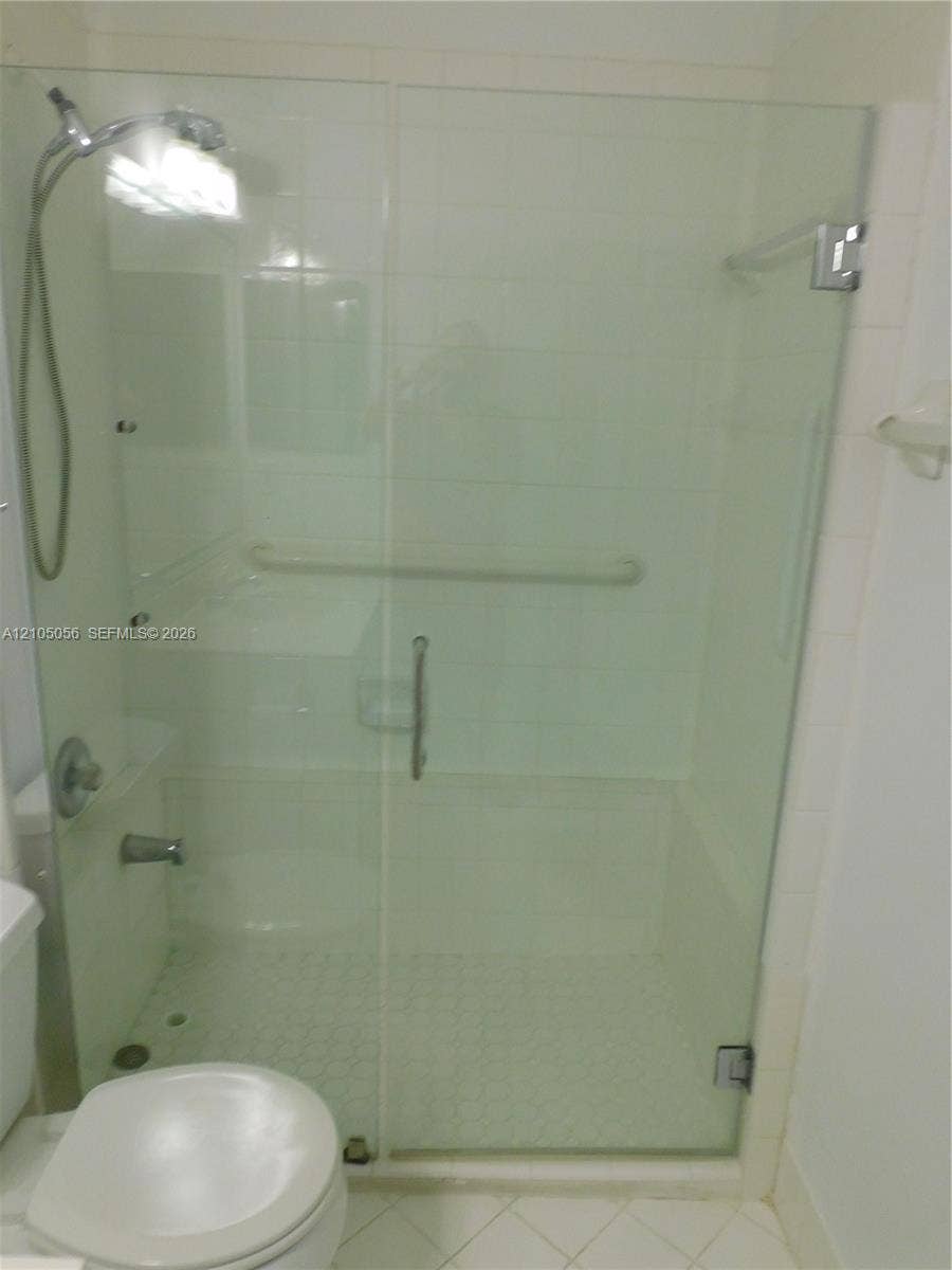 16729 Amber Lake, Weston, FL 33331 Downstairs bathroom step in shower.