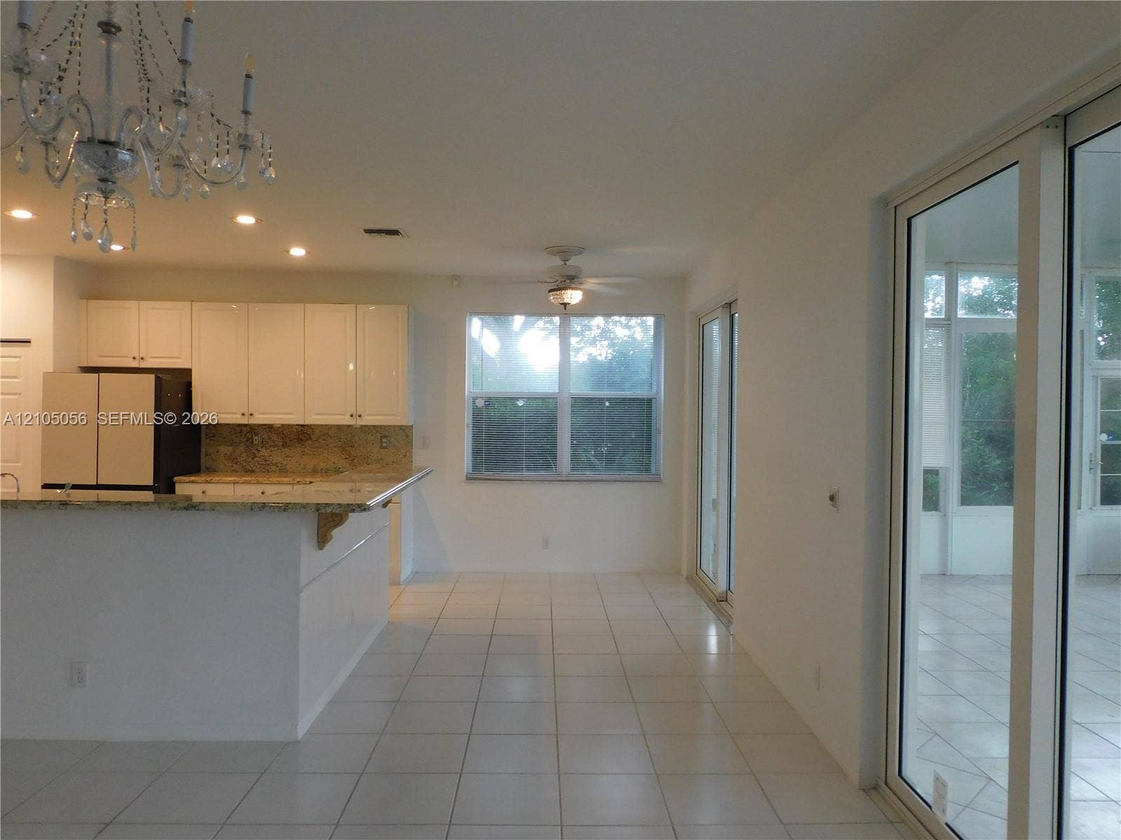 16729 Amber Lake, Weston, FL 33331 Breakfast nook right off the kitchen with views to the lake.