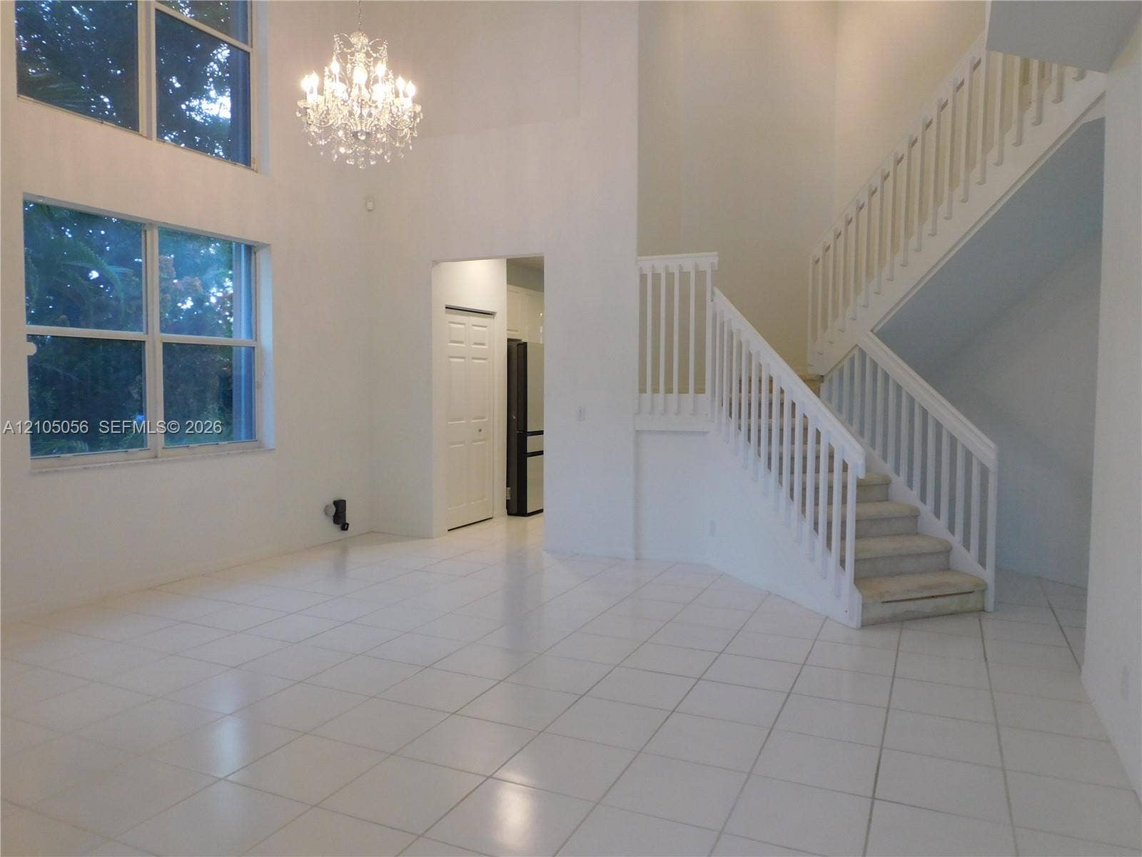16729 Amber Lake, Weston, FL 33331 Living and Dining Room with lots of natural light - high ceiling elevate the sense of spaciousness.