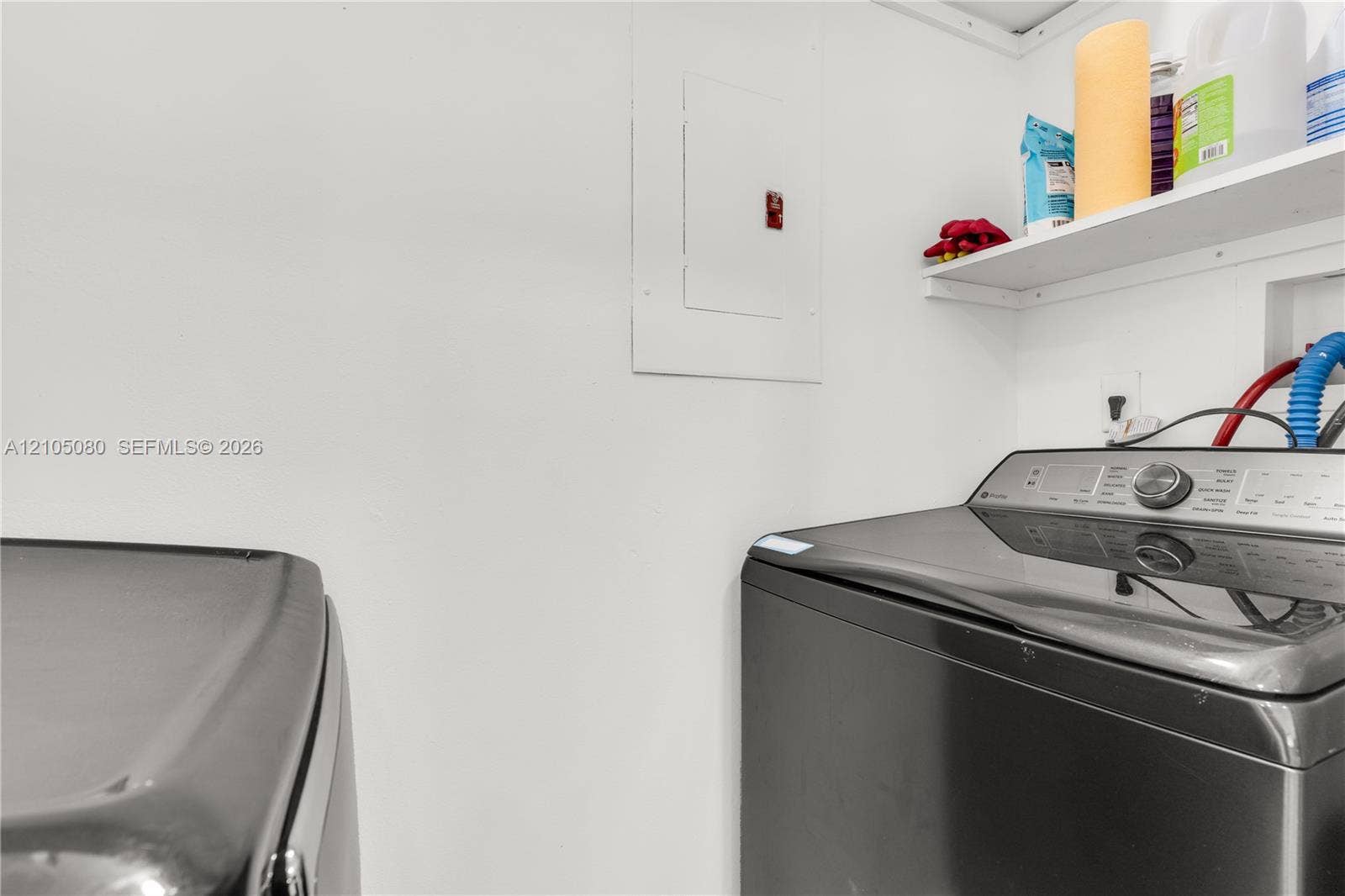 9755 SW 148th Court, Miami, FL 33196 Wall-mounted shelving unit and built-in electrical service panel