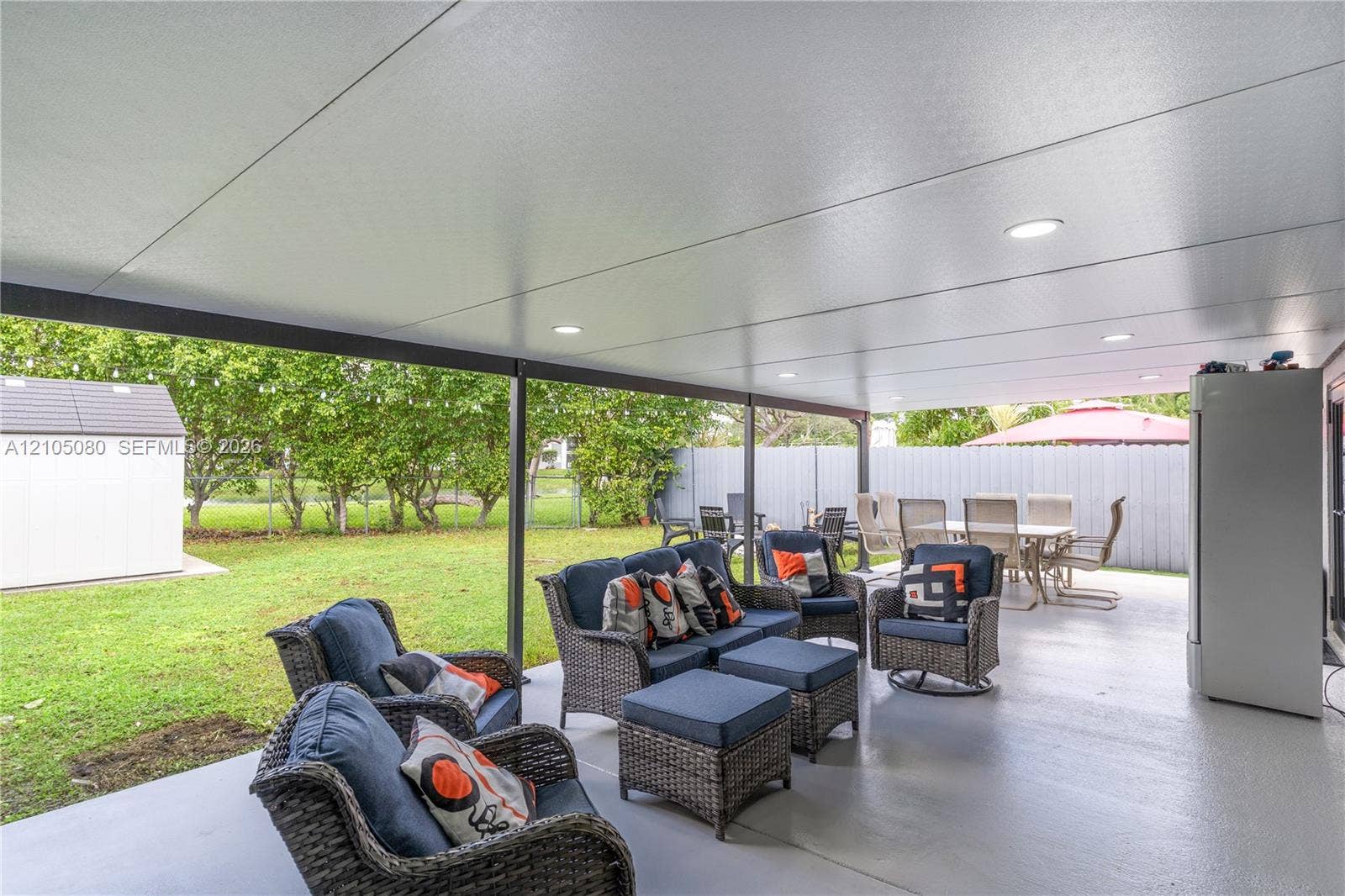 9755 SW 148th Court, Miami, FL 33196 Covered patio featuring a concrete floor, recessed lighting, and metal framing