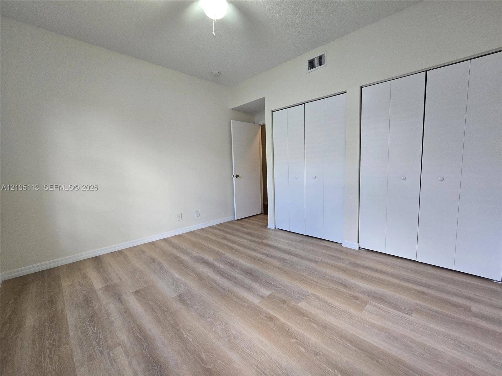 2020 Pompeii Court, Weston, Weston, FL 33327 Light wood-finish flooring, neutral wall tones, and dual closet installations