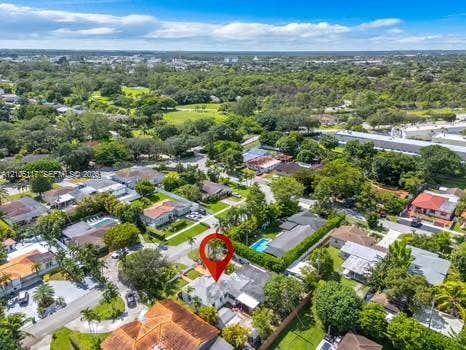 6851 SW 32nd Street, Miami, FL 33155 Aerial perspective of a single-family residence featuring a concrete tile roof and an enclosed backyard