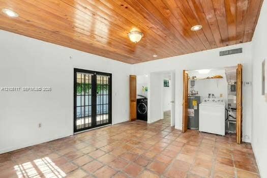 6851 SW 32nd Street, Miami, FL 33155 Interior space featuring terra cotta tile flooring, vaulted wood-plank ceiling, recessed lighting, and dual French doors with black frames