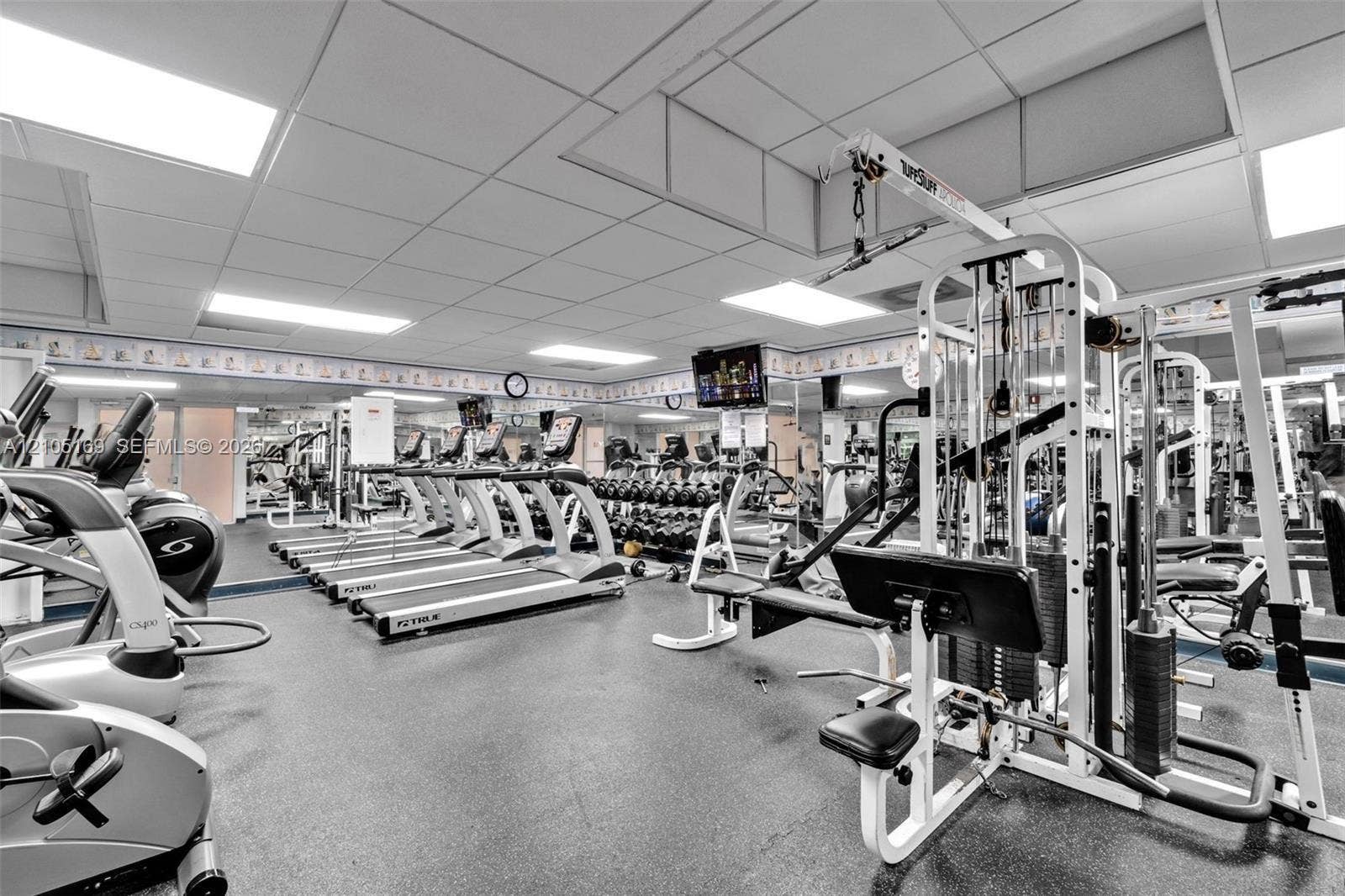 2899 Collins Avenue, #521, Miami Beach, FL 33140 Fitness center featuring extensive cardio equipment, strength training machines, free weights, and resilient flooring