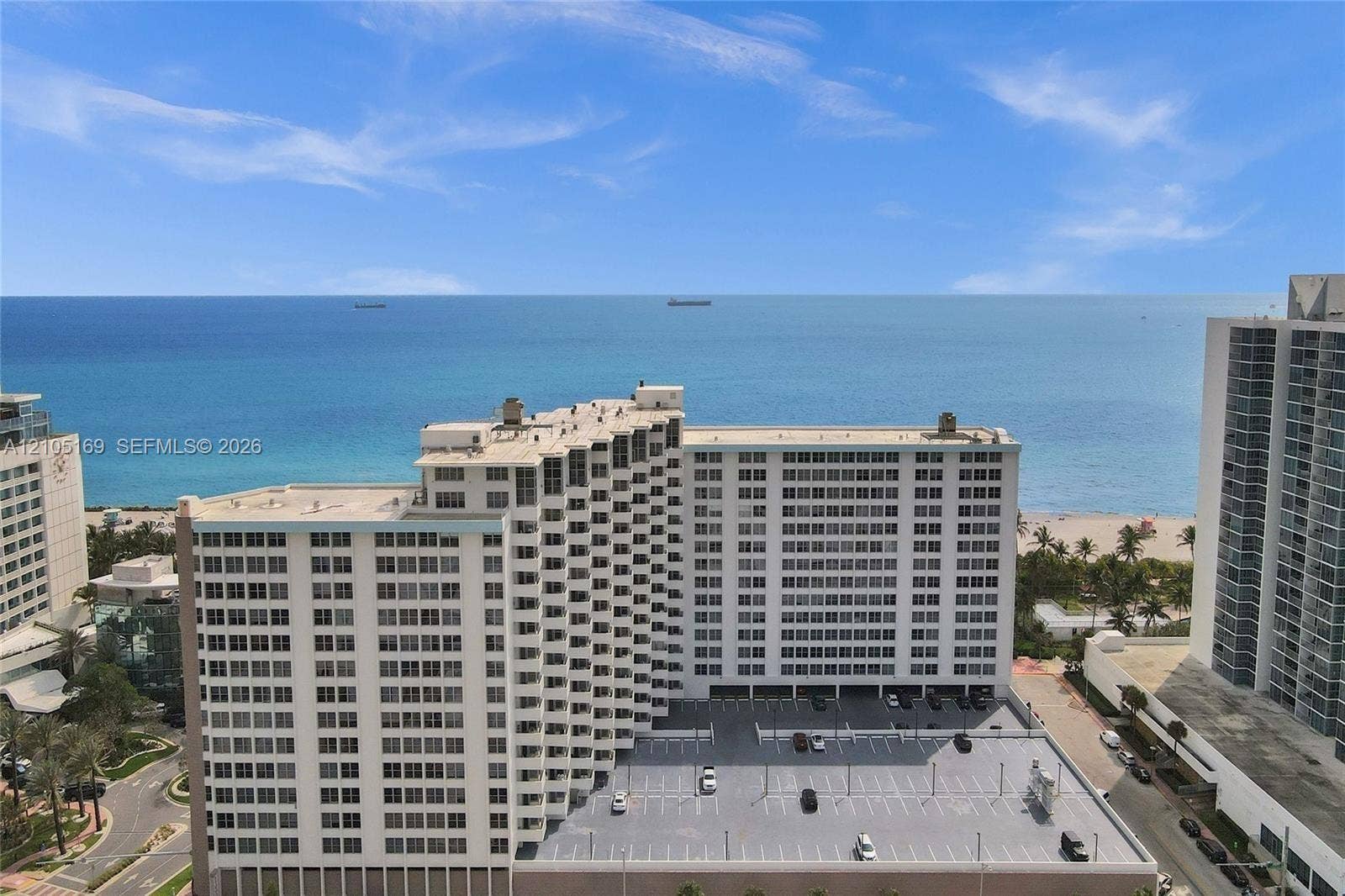 2899 Collins Avenue, #521, Miami Beach, FL 33140 Oceanfront high-rise building featuring a multi-story parking structure