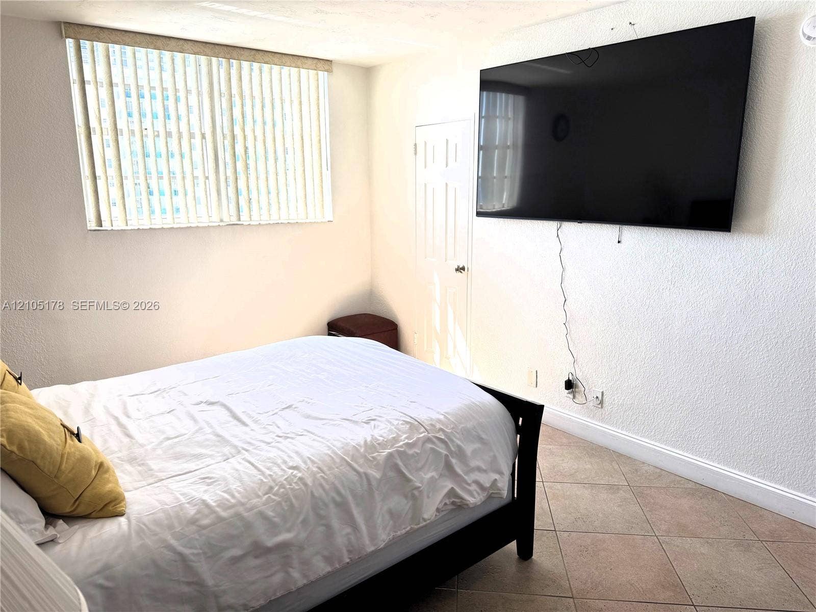 3801 S Ocean Drive, #10G, Hollywood, Hollywood, FL 33019 primary bedroom with 75" tv