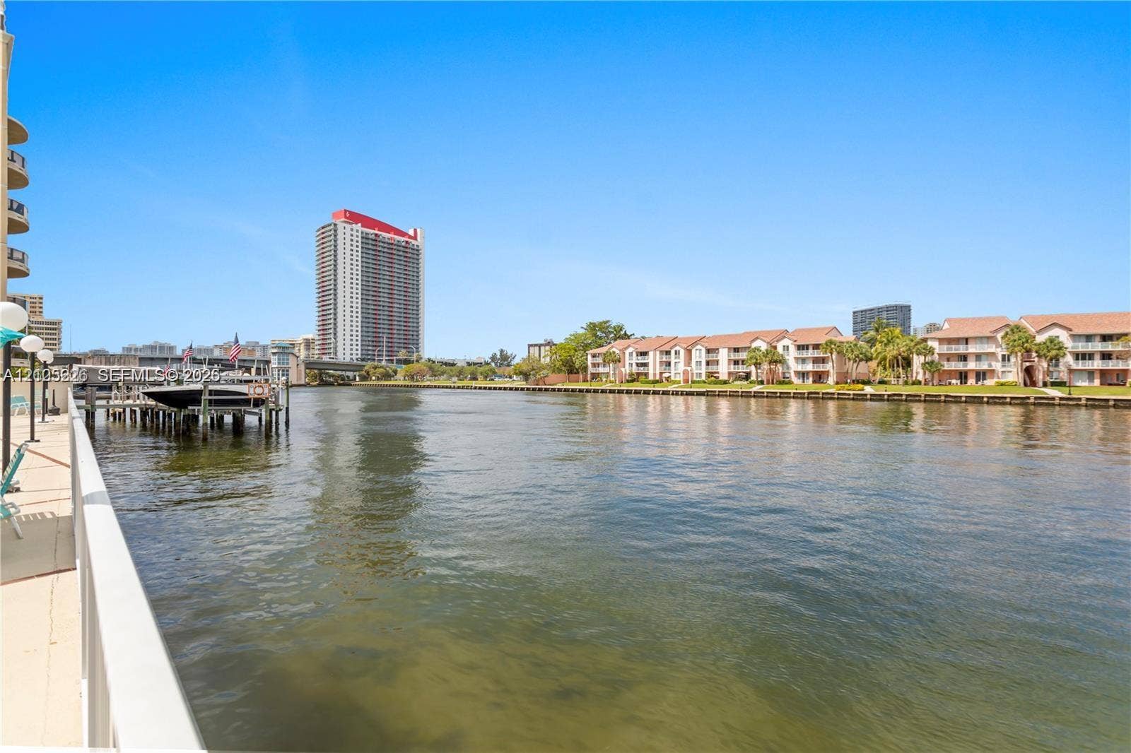 3800 S Ocean Drive, #801, Hollywood, Hollywood, FL 33019 Waterfront walkway featuring a concrete bulkhead and private boat dock