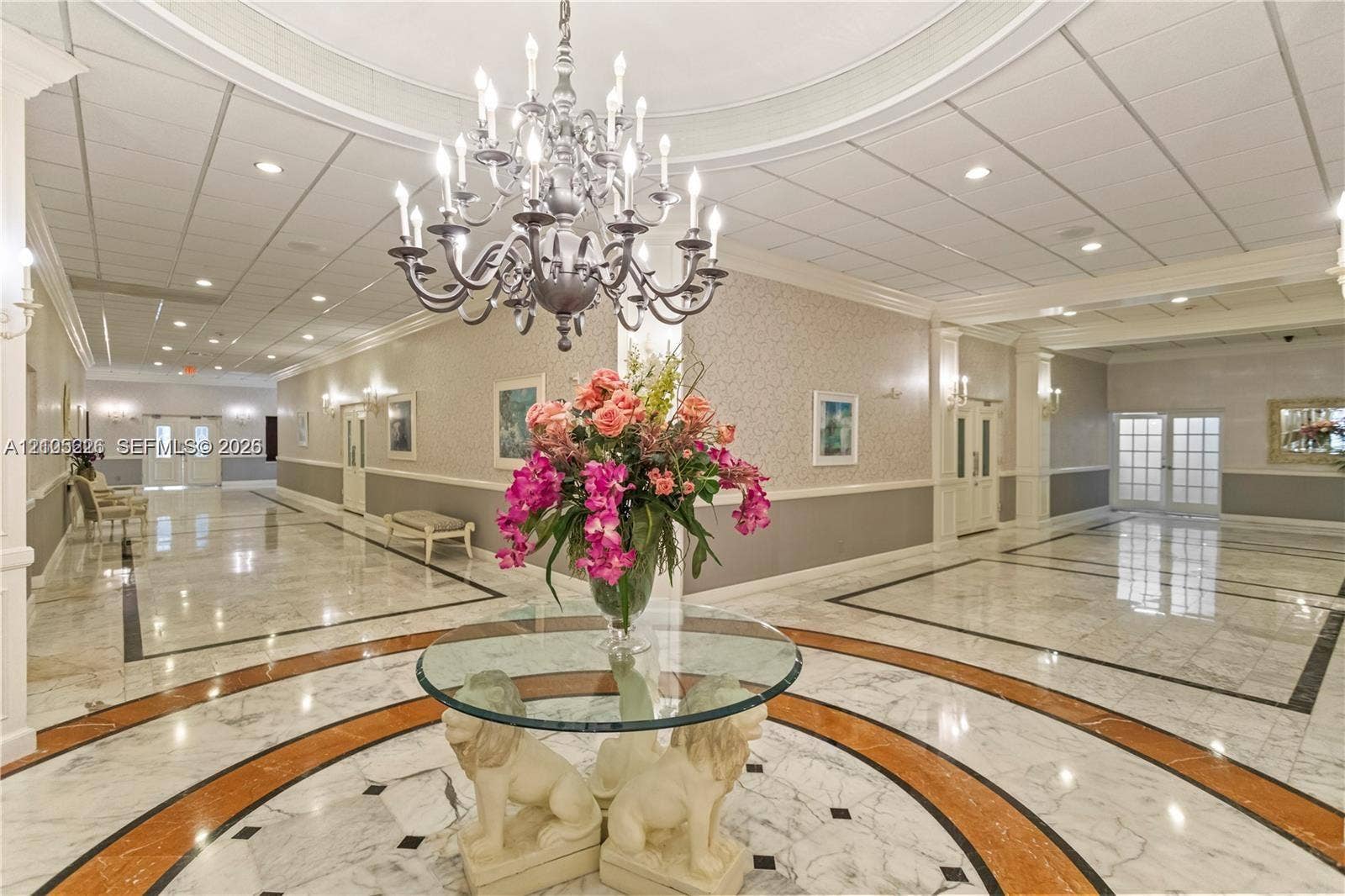 3800 S Ocean Drive, #801, Hollywood, Hollywood, FL 33019 Fitness room featuring rubberized flooring, drop ceiling with recessed lighting, and wall-to-wall mirror panels