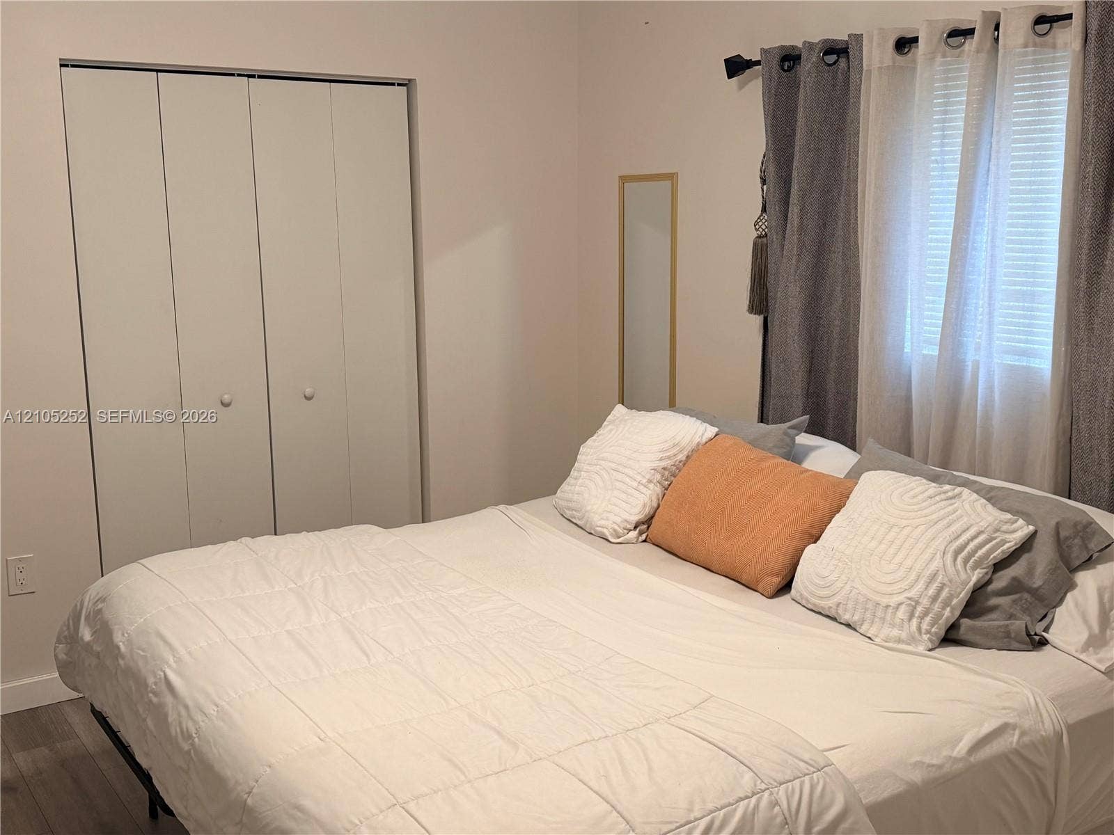 700 NW 17th Terrace, Pompano Beach, FL 33069 Wood-finish flooring with neutral wall paint