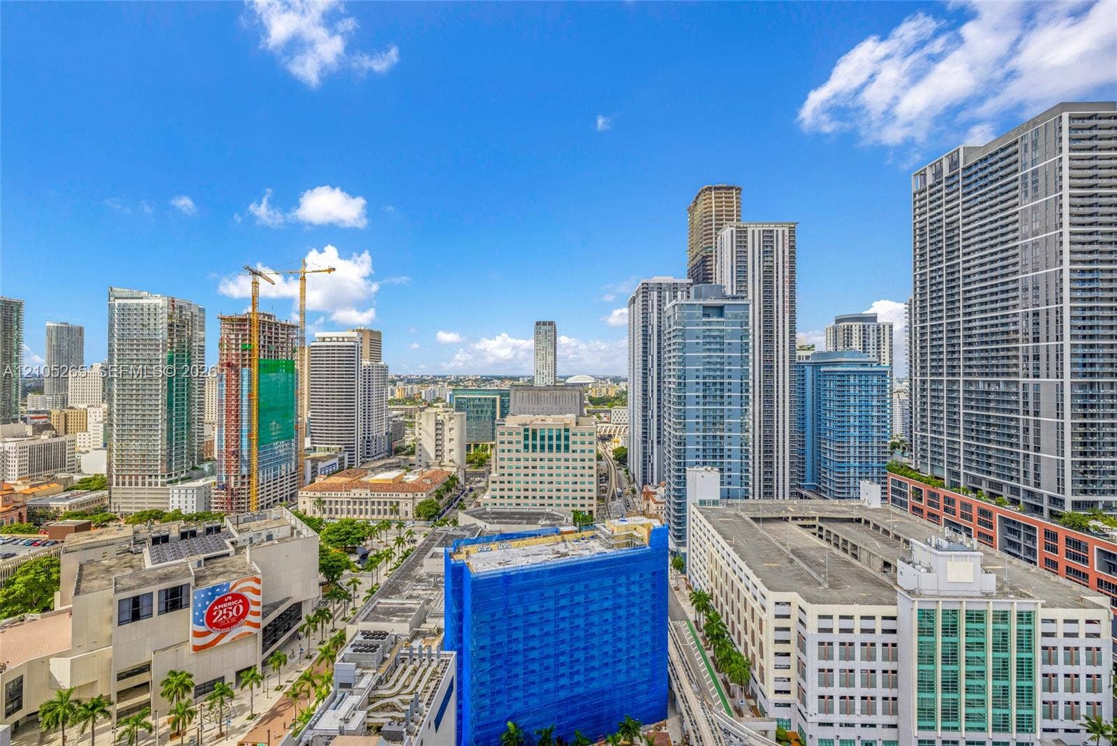398 NE 5th Street, #2219, Miami, FL 33132 High-rise perspective featuring an expansive cityscape, glass-facade towers, and urban architectural density
