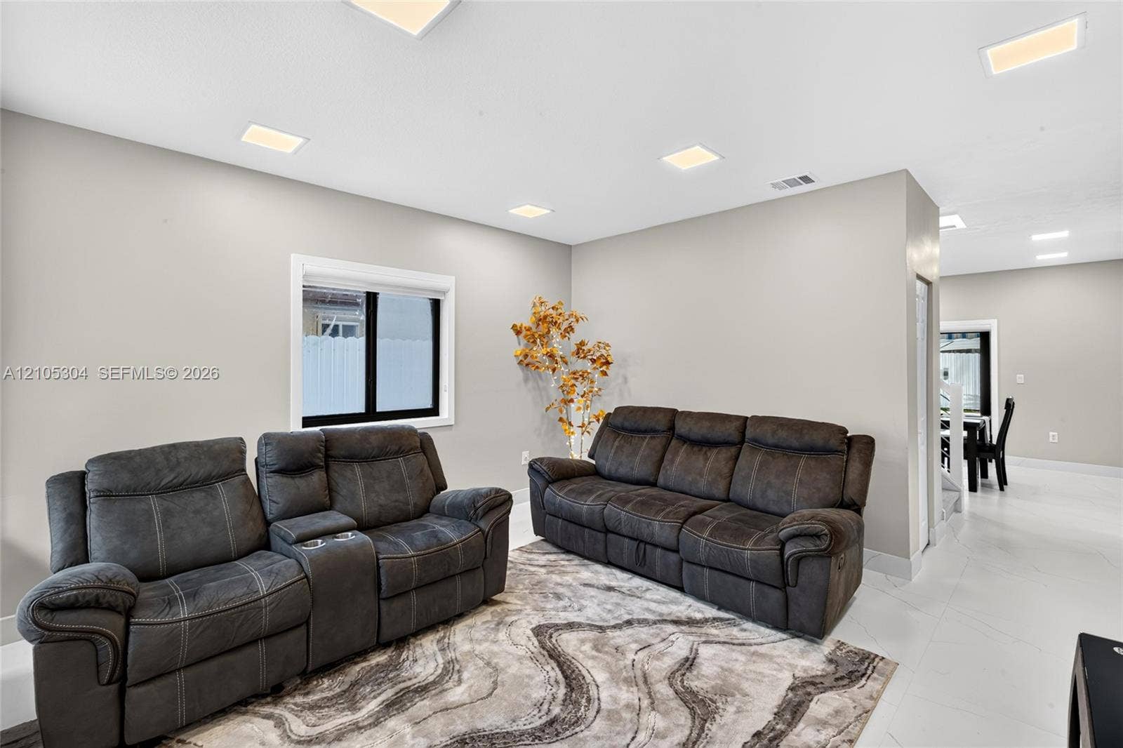 15217 SW 36th Terrace, Miami, FL 33185 Neutral wall color, recessed ceiling lighting, and large-format tile flooring