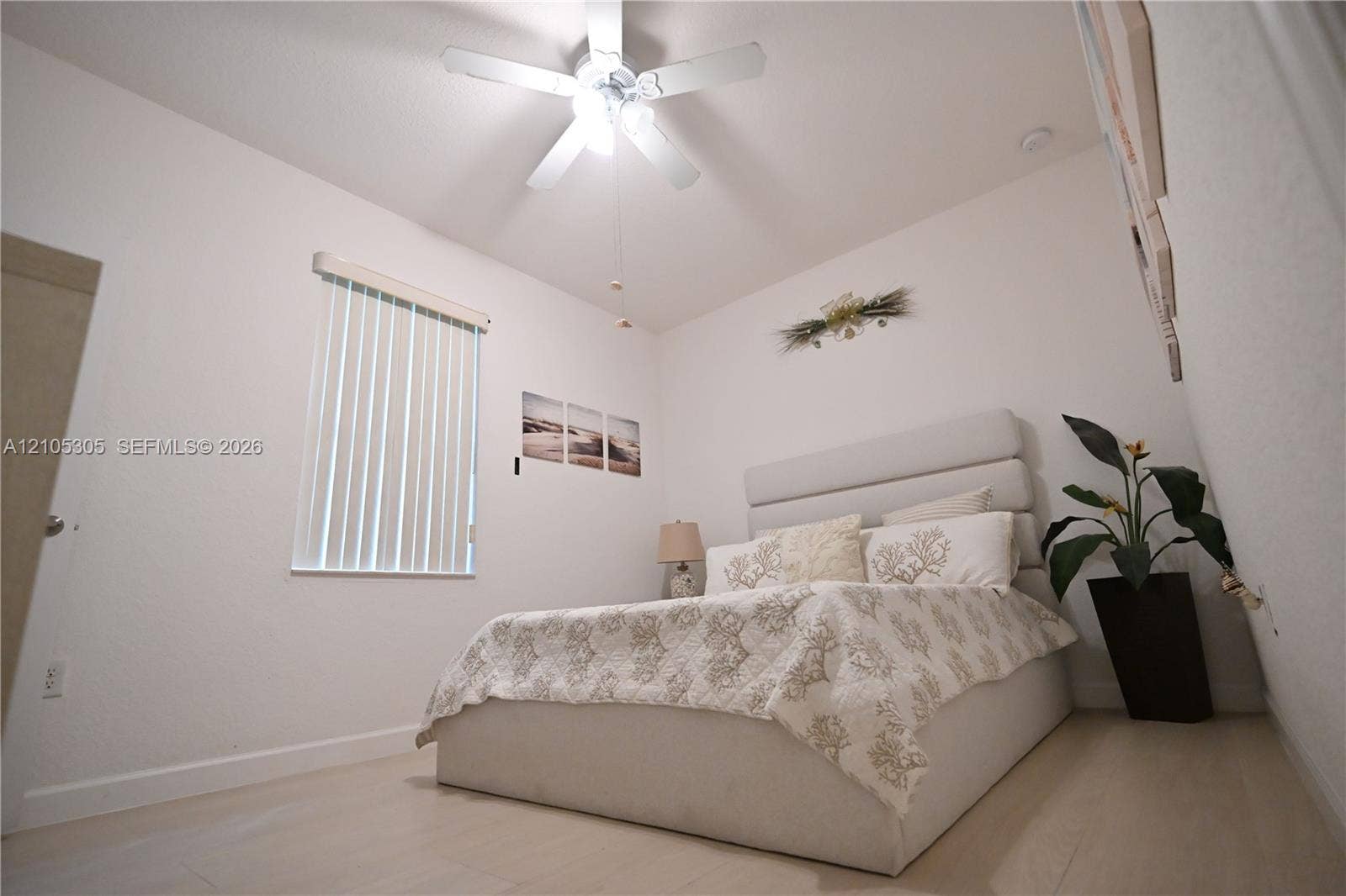 Recessed lighting with a ceiling fan, window with vertical blinds, and light-toned flooring