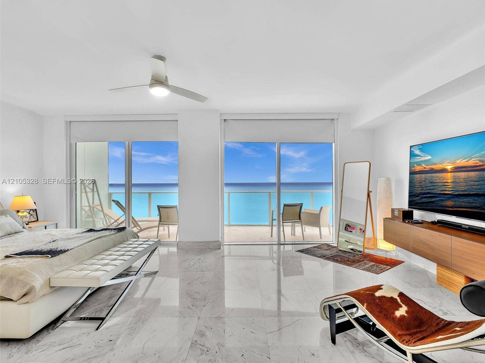 3951 S Ocean Drive, #1901, Hollywood, FL 33019 Wake up to breathtaking ocean views from the comfort of your bed in this spacious primary suite, featuring floor-to-ceiling sliding glass doors with direct access to a private balcony.