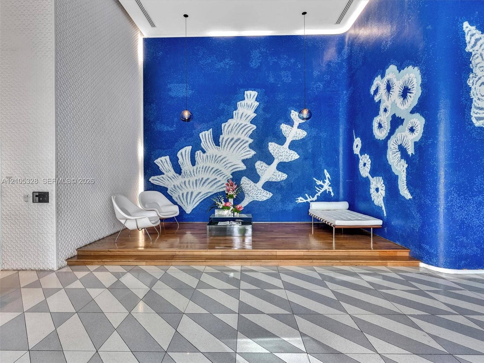 3951 S Ocean Drive, #1901, Hollywood, FL 33019 Step into an elegant, contemporary lobby with the intimate ambiance of a luxury boutique hotel, featuring distinctive designer finishes, stylish architectural details, sophisticated accent lighting, and a welcoming atmosphere.