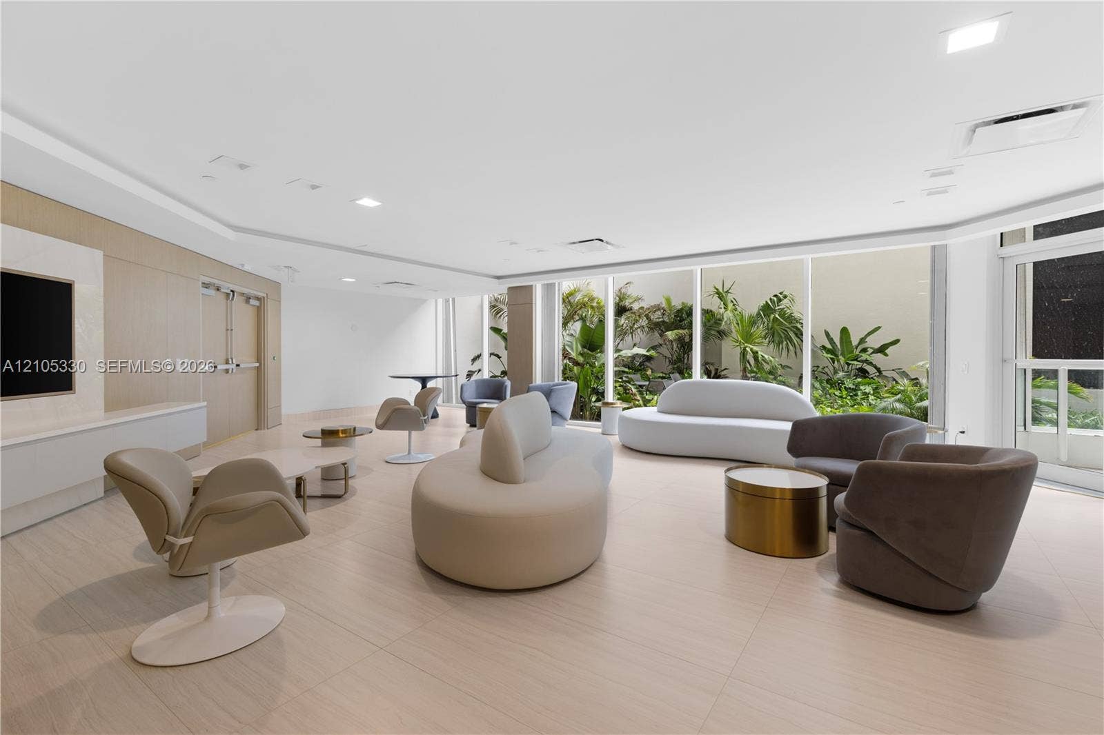 21205 Yacht Club Drive, #304, Aventura, FL 33180 Recessed lighting, wood-finish wall panels, and large-format tile flooring