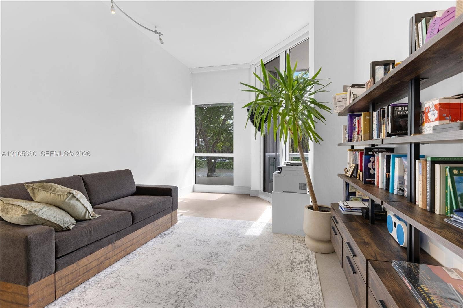 21205 Yacht Club Drive, #304, Aventura, FL 33180 White walls, recessed lighting, and a full-height window create a bright interior