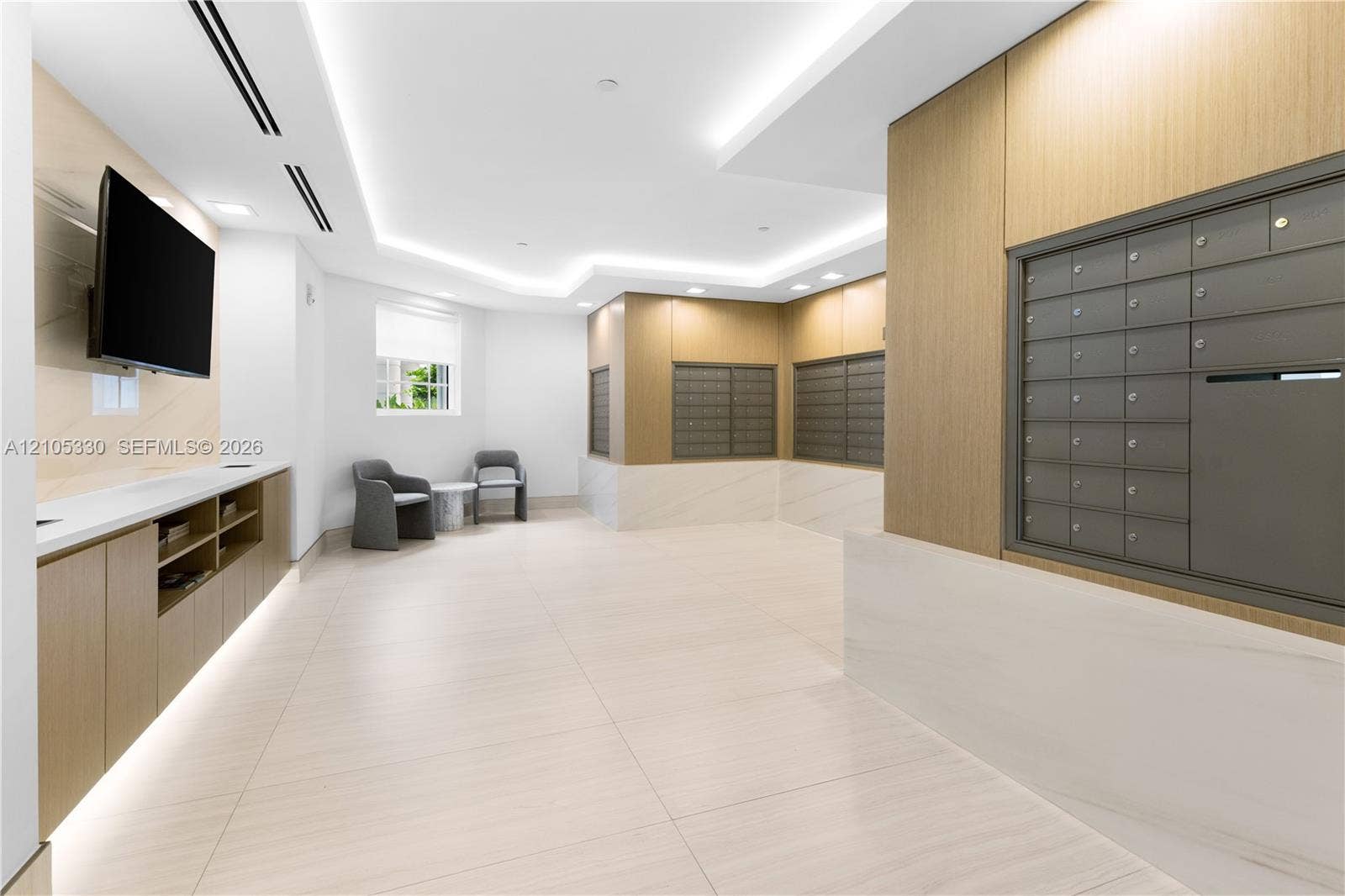 21205 Yacht Club Drive, #304, Aventura, FL 33180 Recessed ceiling lighting, wood-finish wall panels, built-in cabinetry, and tile flooring