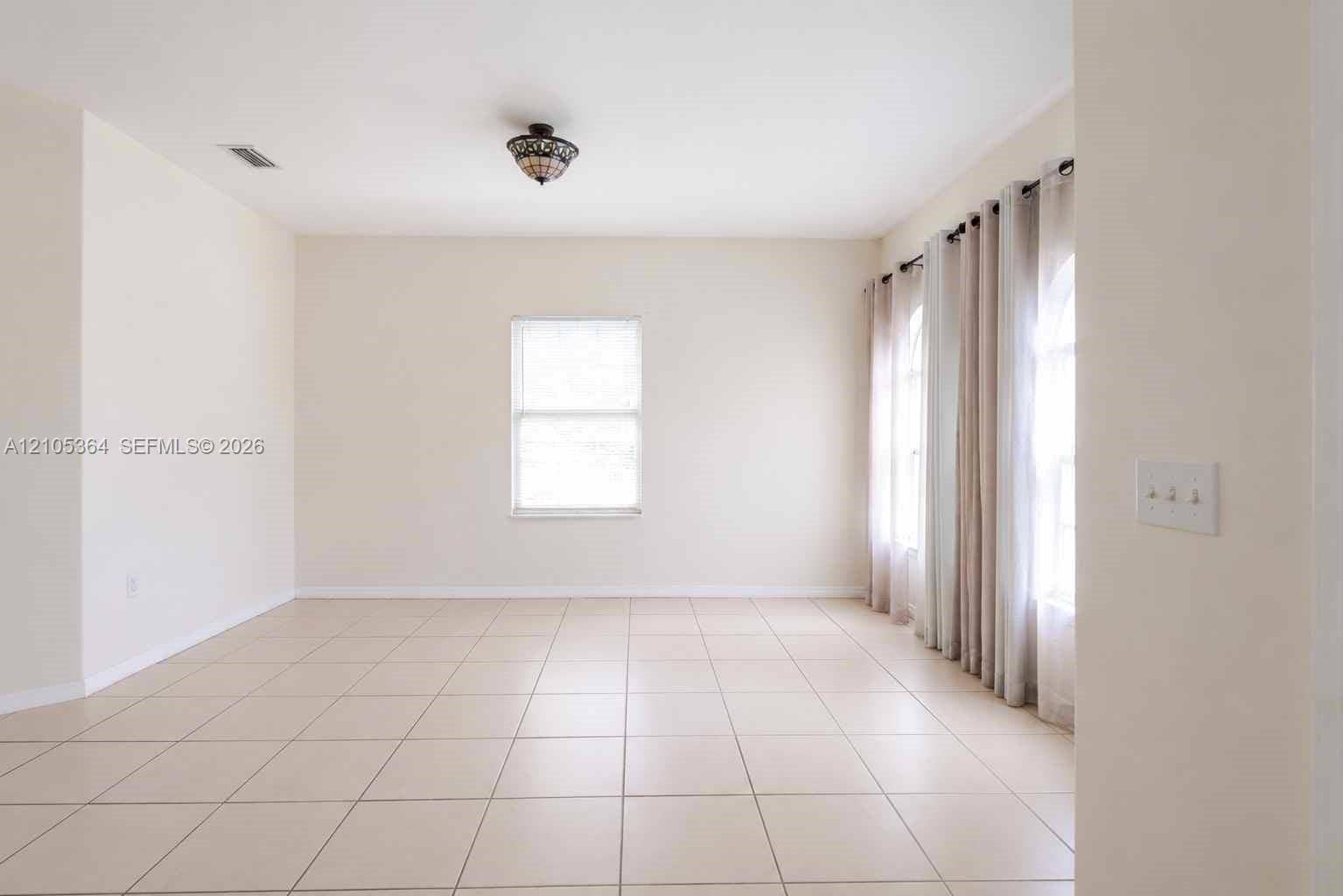 Tiled flooring with neutral-toned walls