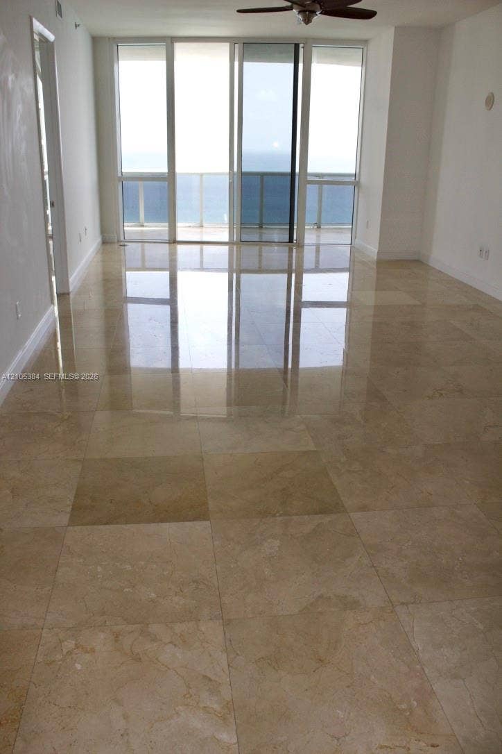 16001 Collins Avenue, #2803, Sunny Isles Beach, Sunny Isles Beach, FL 33160 Expansive polished tile flooring with natural light from floor-to-ceiling windows