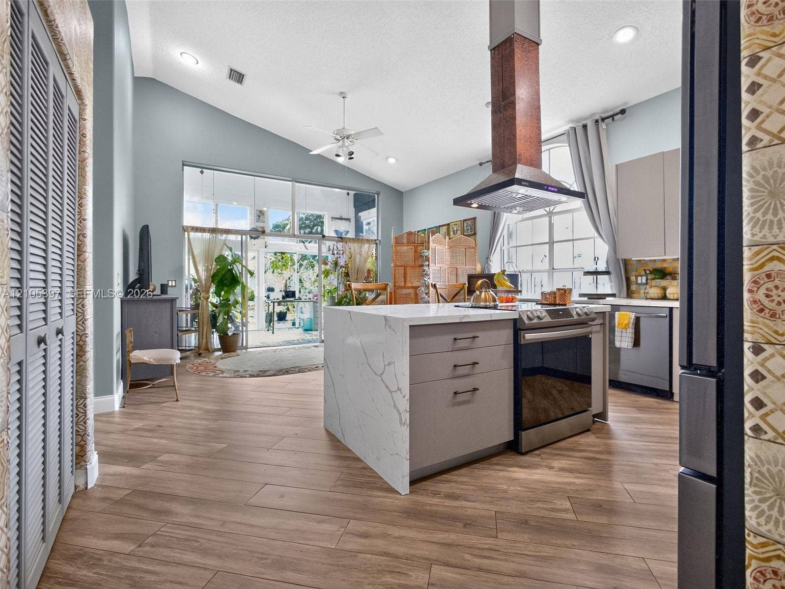 Kitchen featuring a center island with quartz surfacing, ideal for entertaining!