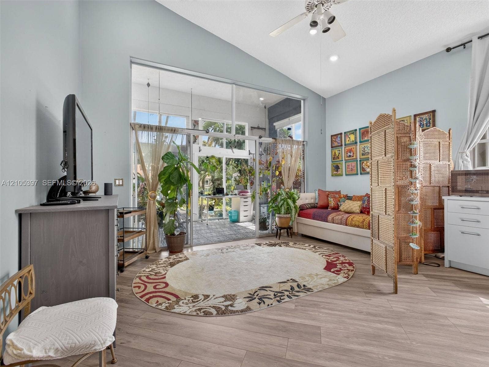 Vaulted ceiling, full of light, adjacent to the kitchen and sun room.