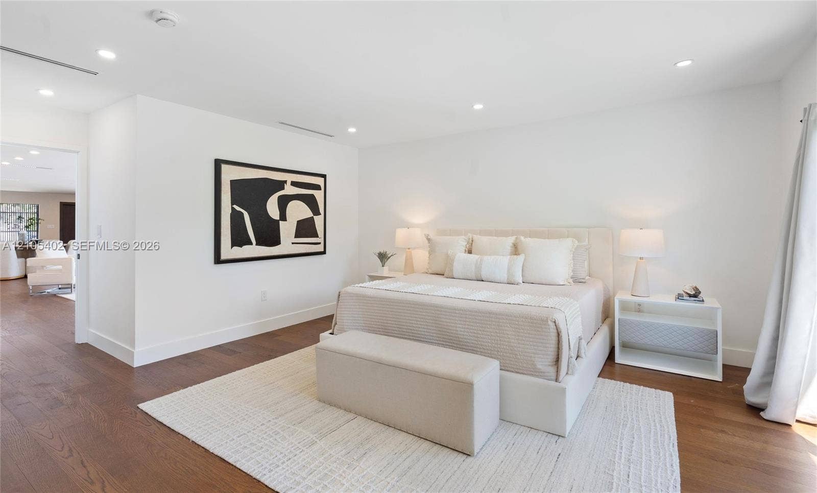 1911 SW 18th Avenue, Miami, FL 33145 Bedroom featuring wood-finish flooring, recessed lighting, and smooth-finish walls