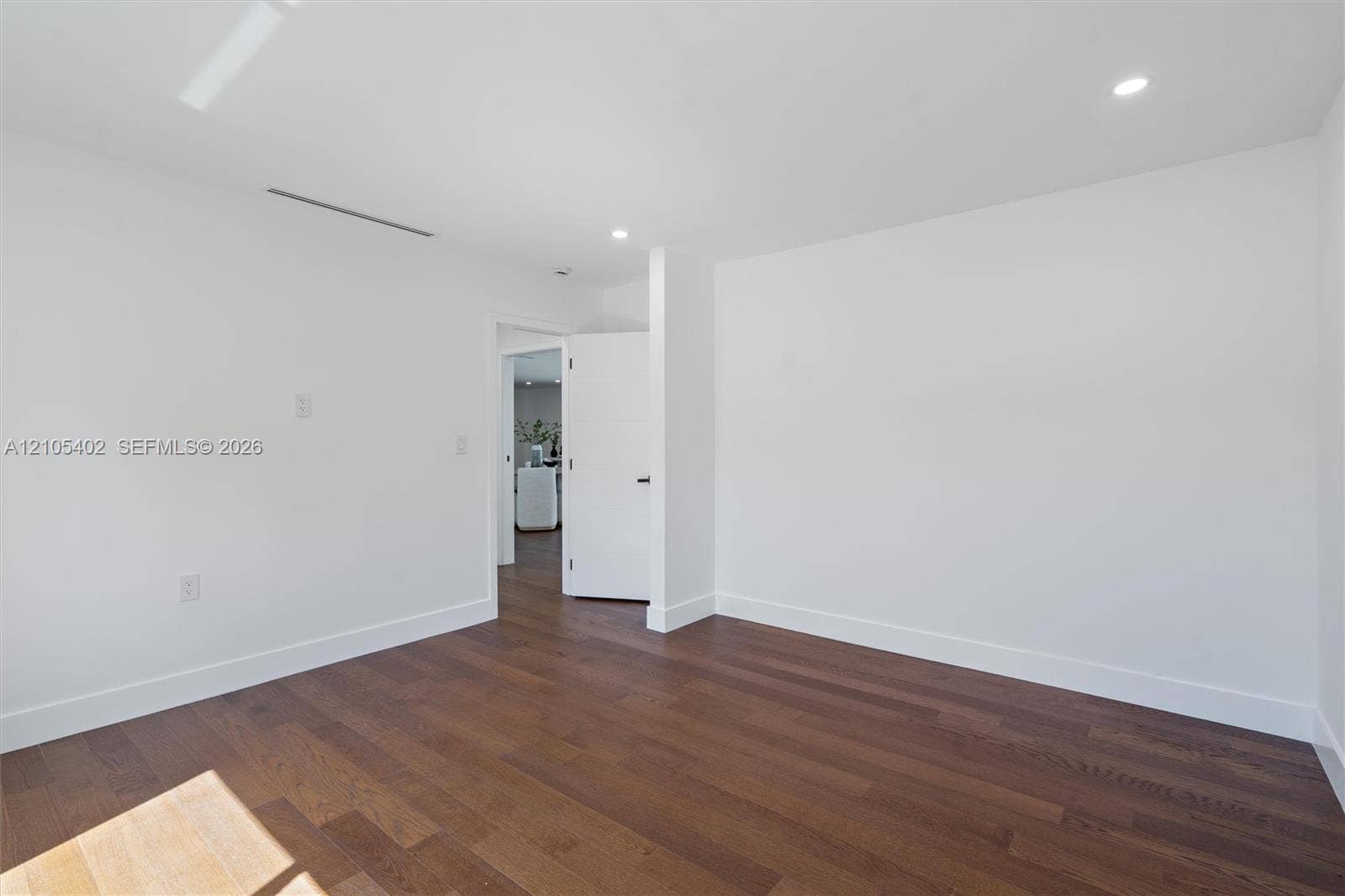 1911 SW 18th Avenue, Miami, FL 33145 Wood-finish flooring, recessed lighting, and crisp white wall finishes