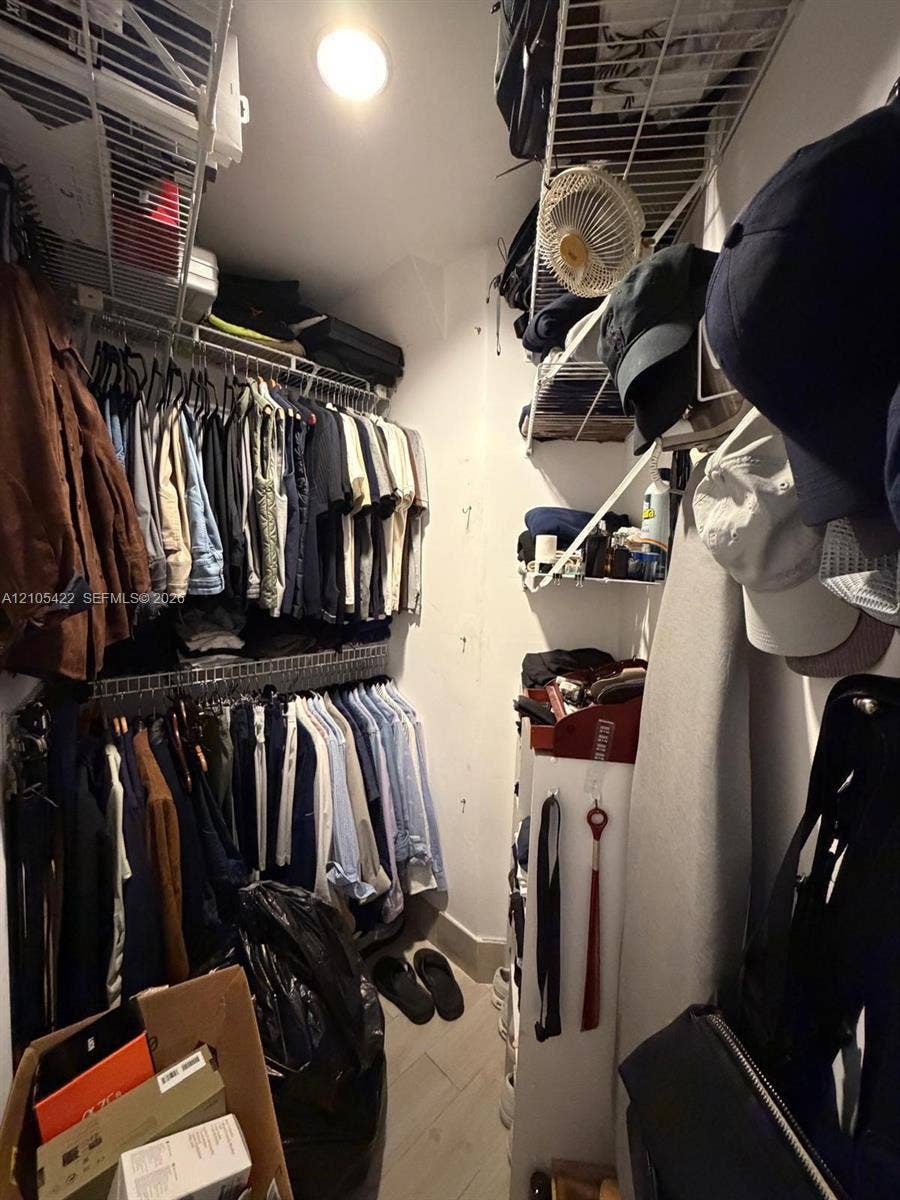 14631 SW 150th Street, Miami, FL 33186 Walk-in closet featuring multi-level wire shelving and neutral tile flooring