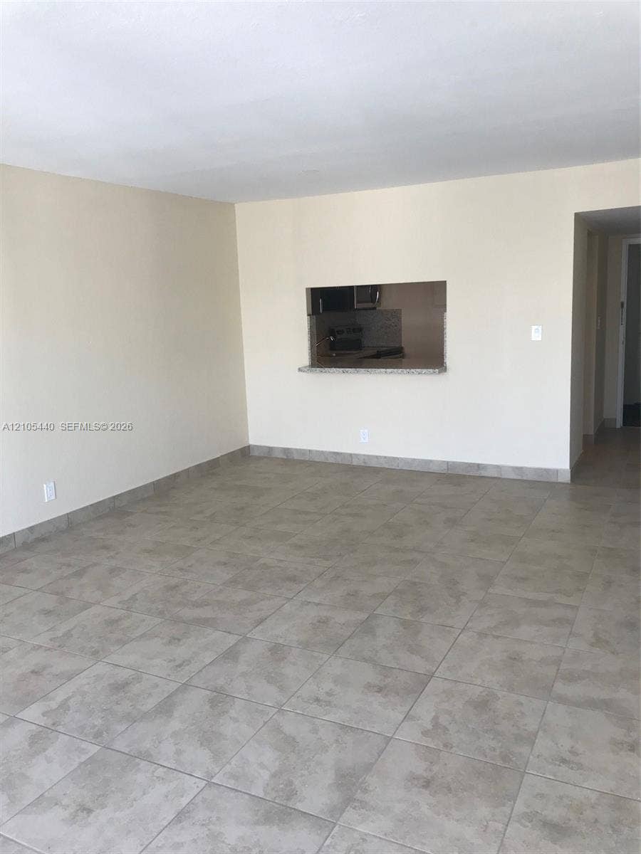 16710 NE 9th Avenue, #707, North Miami Beach, North Miami Beach, FL 33162 Neutral-toned tile flooring throughout