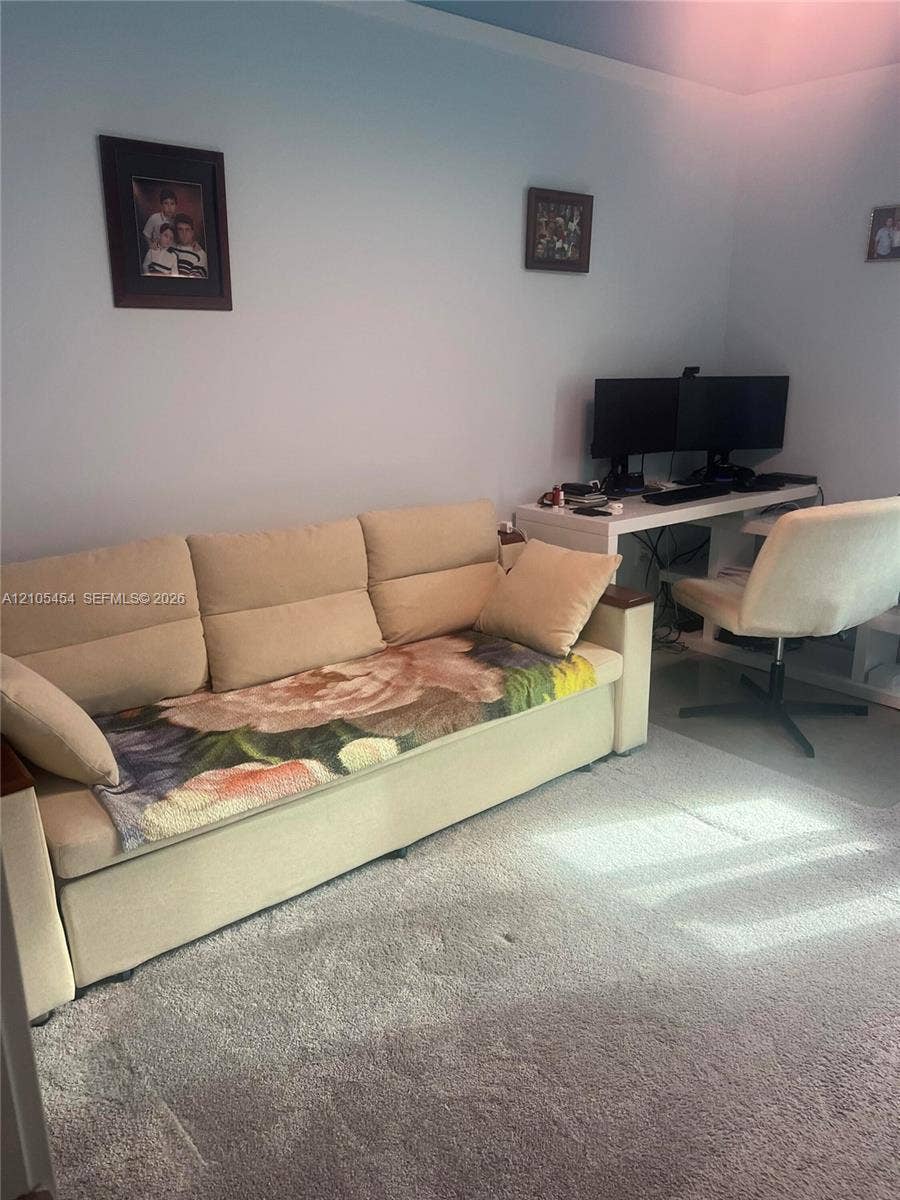 4745 NW 84th Court, #20, Doral, FL 33166 Light blue wall paint and light gray carpeting