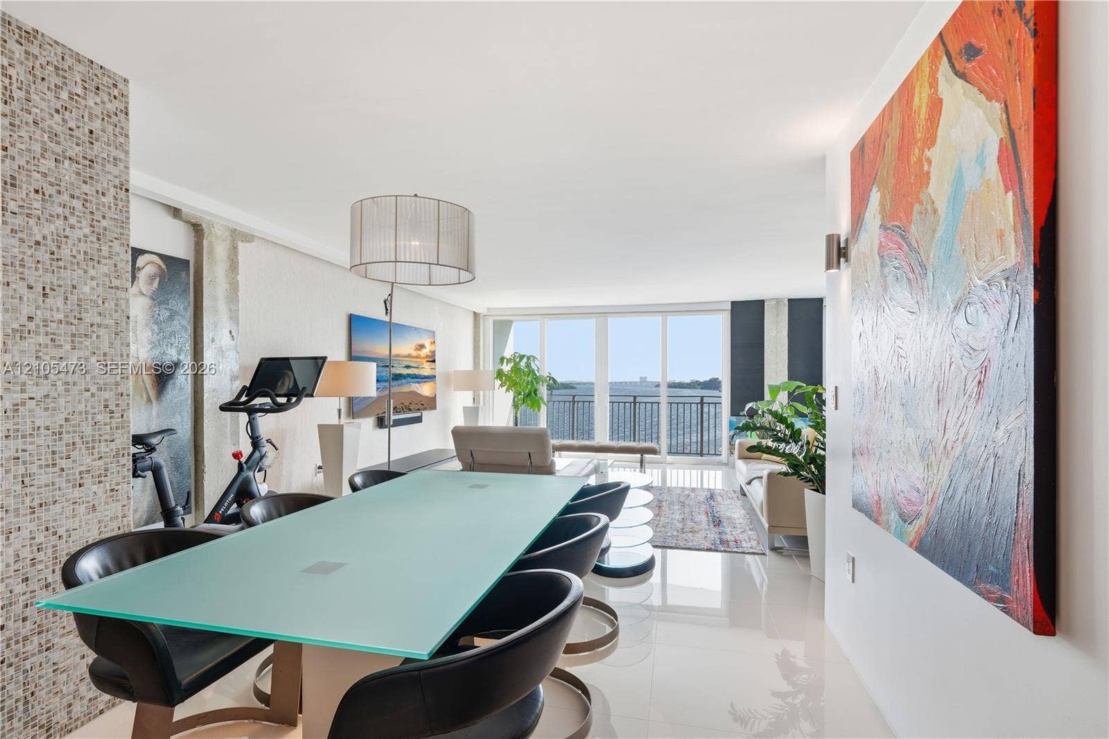 770 NE 69th Street, #6F, Miami, FL 33138 Tile flooring and a mosaic-tiled accent wall