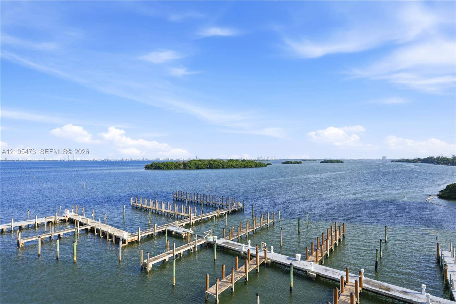 770 NE 69th Street, #6F, Miami, FL 33138 Waterfront setting with multiple docking slips and distant city skyline