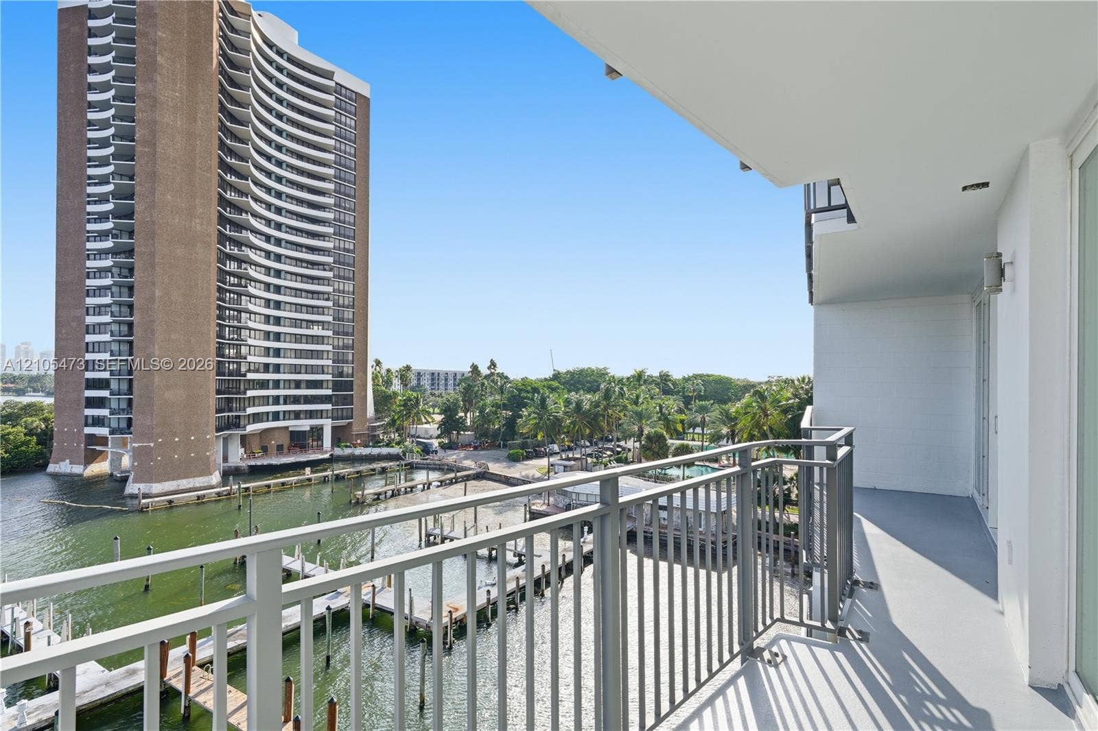 770 NE 69th Street, #6F, Miami, FL 33138 Private balcony with metal railings and water access