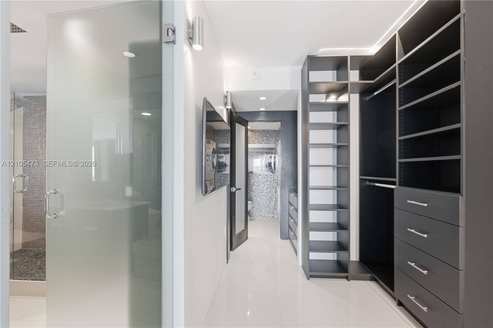 770 NE 69th Street, #6F, Miami, FL 33138 Custom closet organization system featuring built-in shelving and drawers