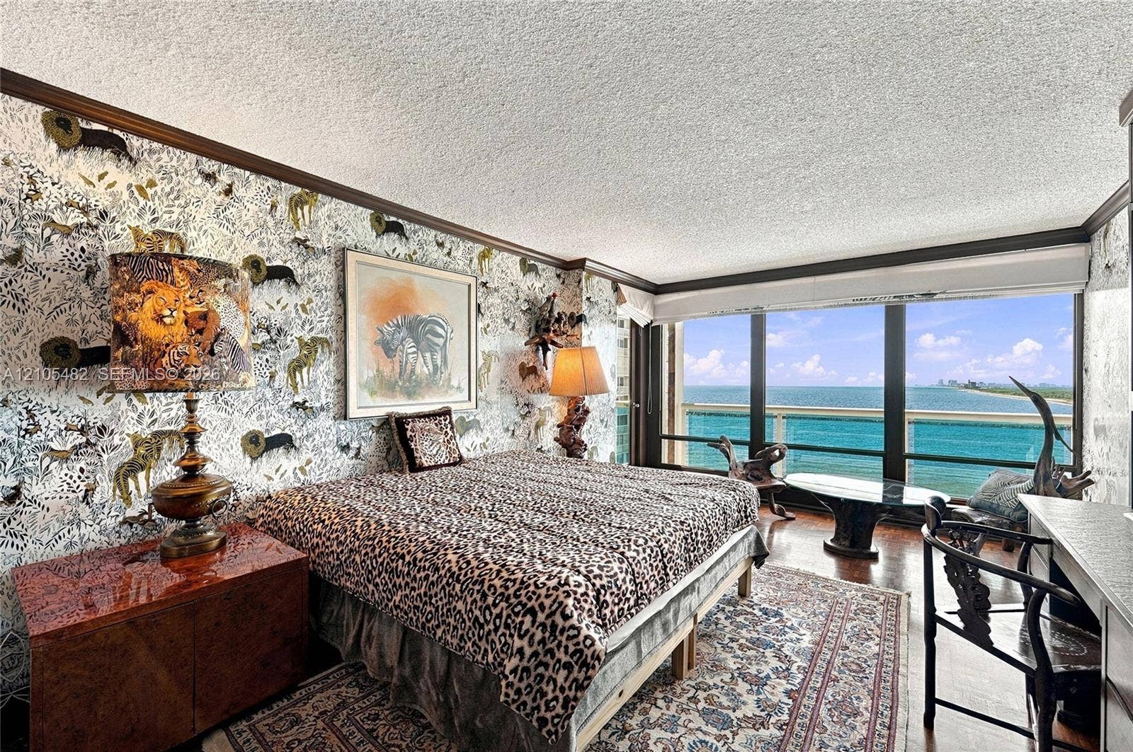 2100 S Ocean Lane, #808, Fort Lauderdale, FL 33316 Expansive floor-to-ceiling windows, private balcony, wood-finish flooring, and crown molding