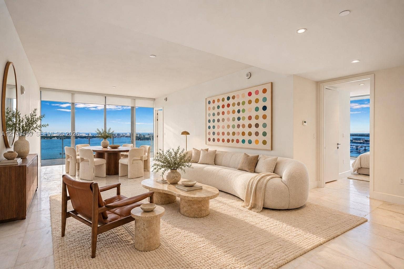 700 NE 26th Terrace, #3603, Miami, FL 33137 Floor-to-ceiling glass walls, stone flooring, and recessed ceiling lighting