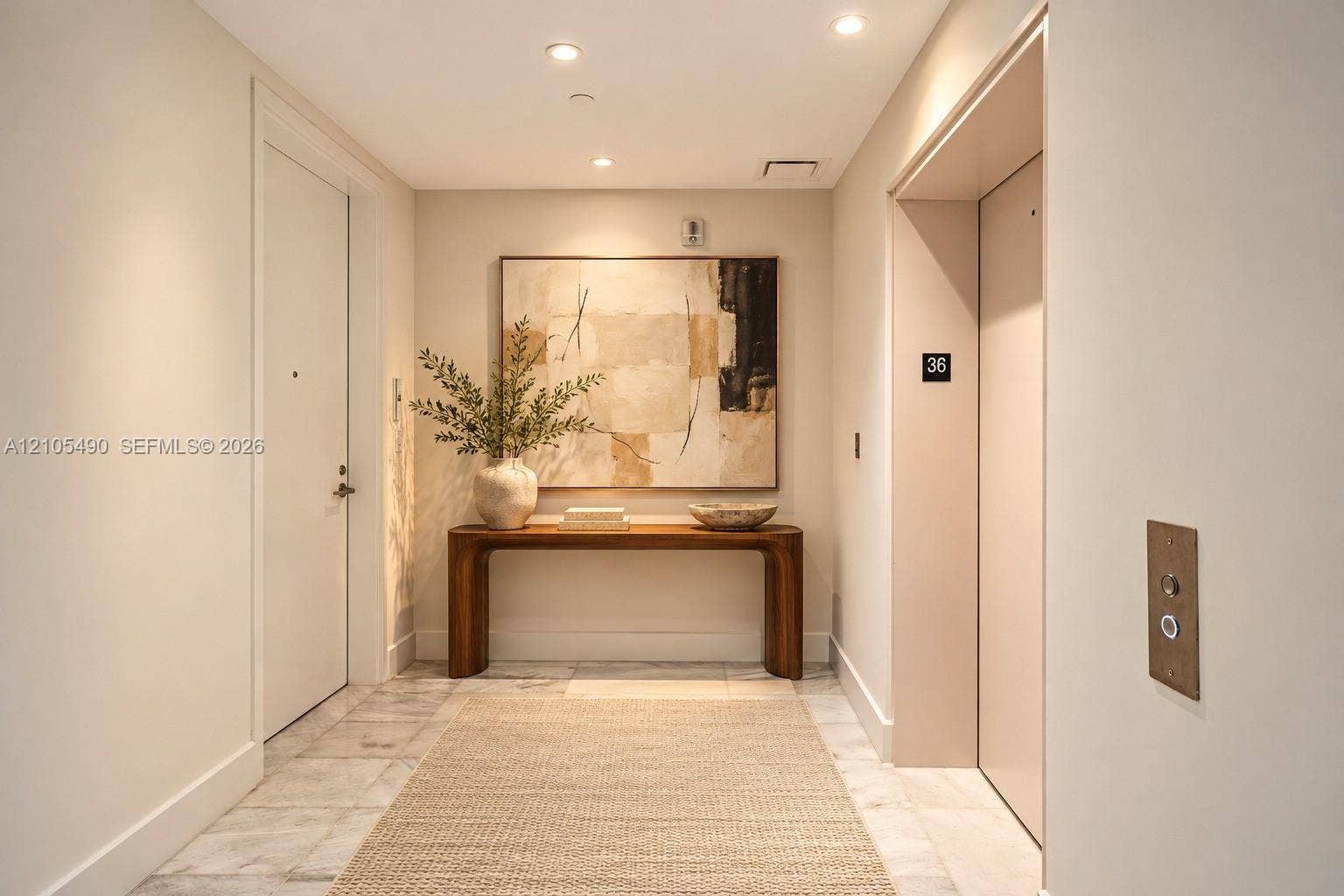 700 NE 26th Terrace, #3603, Miami, FL 33137 Foyer featuring stone tile flooring, recessed ceiling lighting, and a dedicated elevator access point