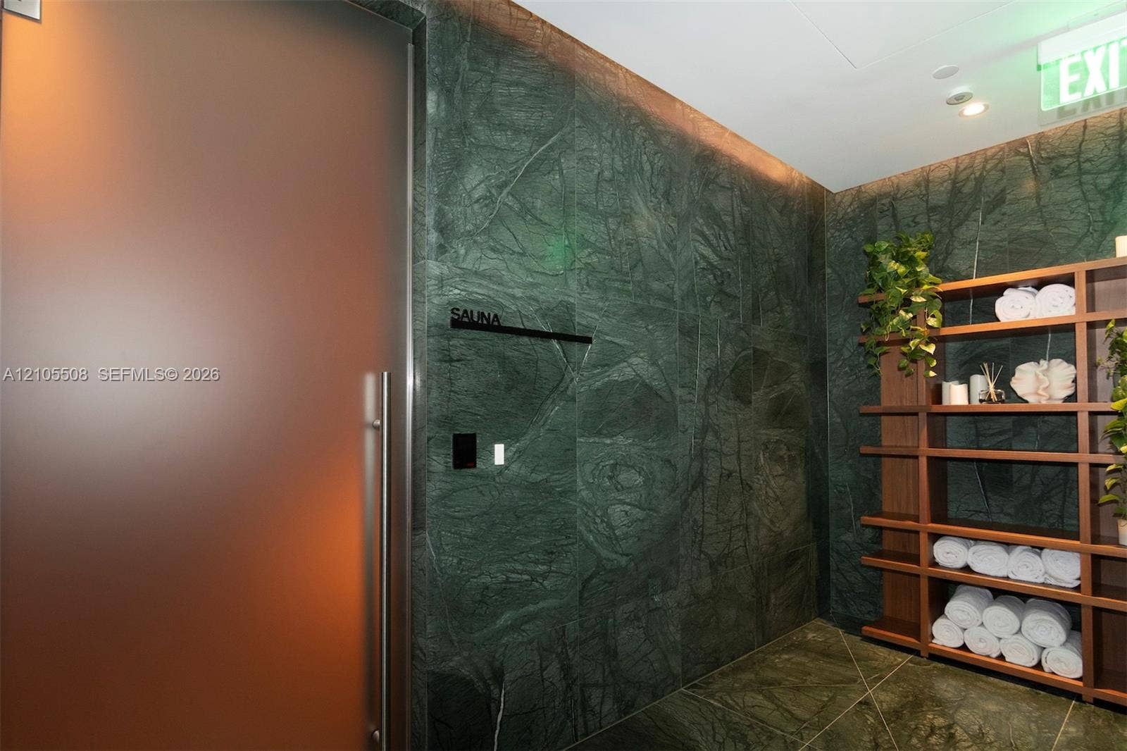 Frosted glass door with a stainless steel handle