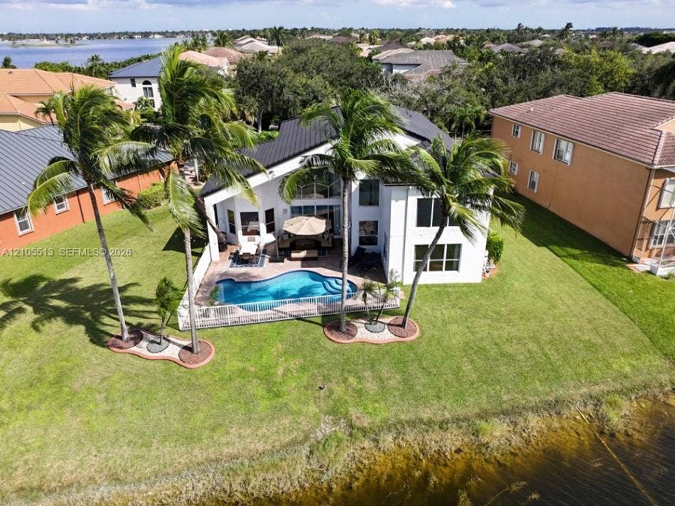 Aerial View of rear w/camera facing East