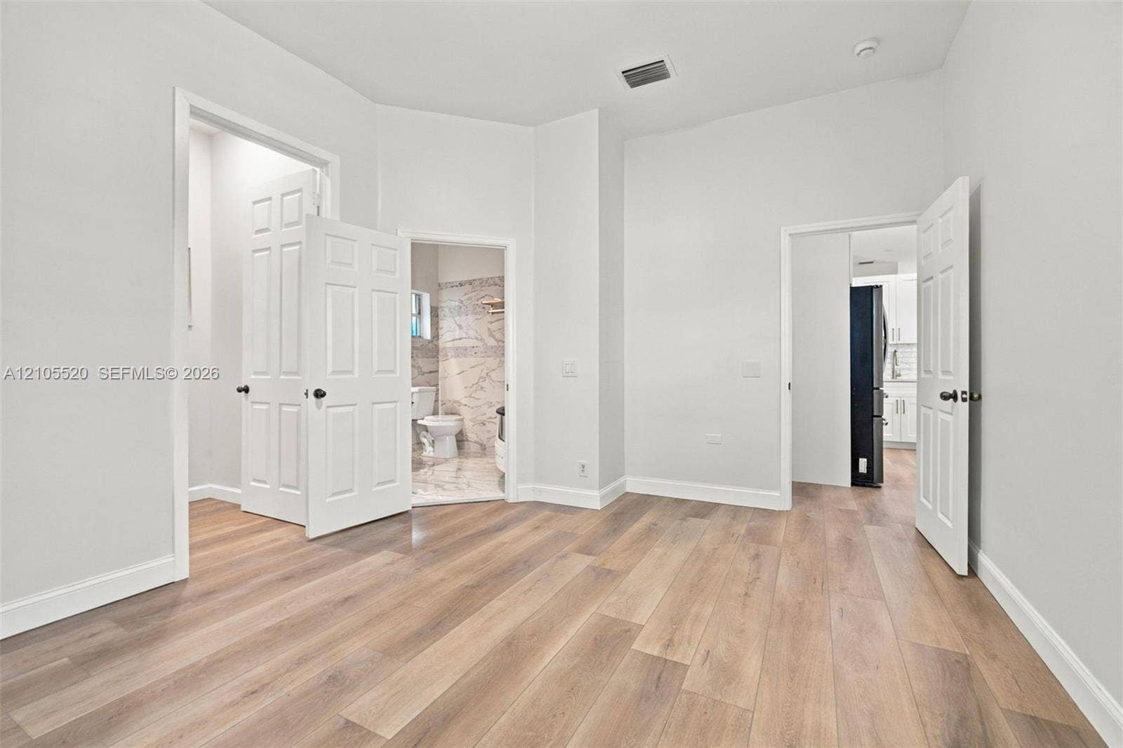 649 Willow Bend Road, Weston, Weston, FL 33327 Interior space featuring wood-finish flooring, high ceilings, and multi-panel interior doors