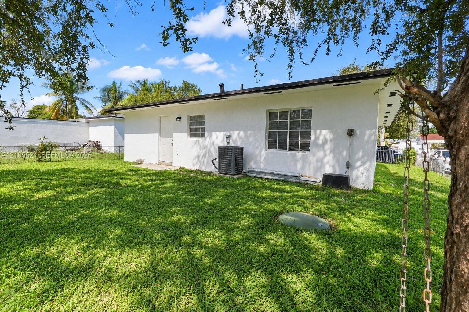 White exterior with multiple windows