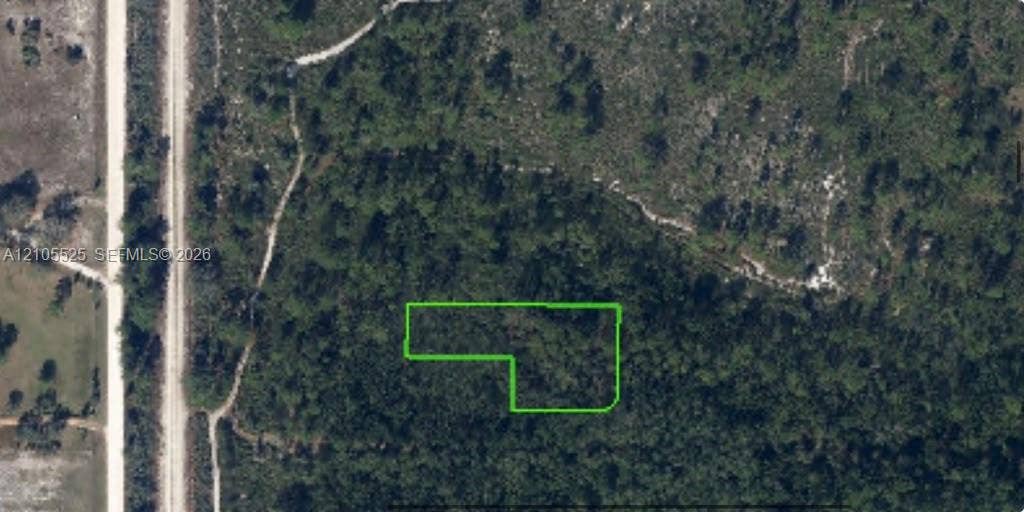 Aerial Parcel Map. Highlighting the surveyed boundaries of the property